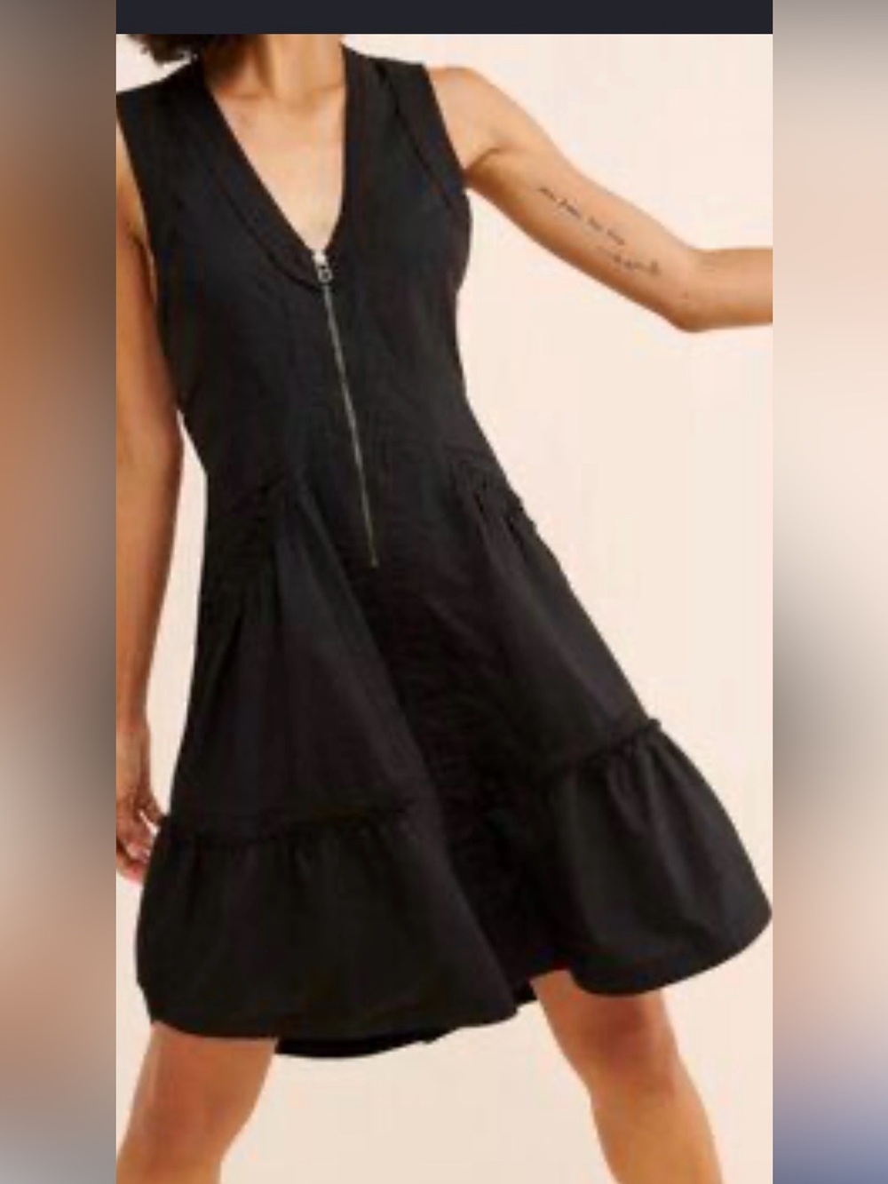 The black Daily Practice Trek Utility Mini Dress by Anthropologie features a fun